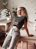 hot blonde girl  sitting on a table in black super driven  signature unique motivational t-shirt a great present for entrepreneurs 