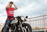 man on a motorcycle putting on his bike glasses wearing a red super driven signature unique motivational t-shirt a great present for entrepreneurs