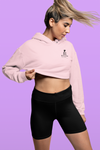 blonde model showing off her abs in pale pink super driven future billionaire motivational crop hoodie
