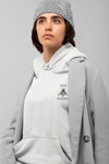 woman staring seriously wearing super driven  bee focused arctic white hoodie 