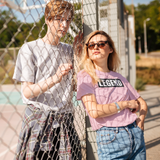 girl leaning on the fence in her super driven unique motivational t-shirt  a great gift for entrepreneurs 